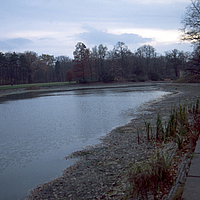 Rainwater retention basin with concrete mat cover on the bank sides to prevent erosion