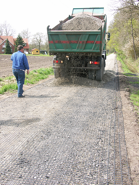 Gravel is tipped onto the Basetrac Grid by lorry