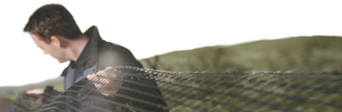 Examining Geogrid A person with geogrid in hand