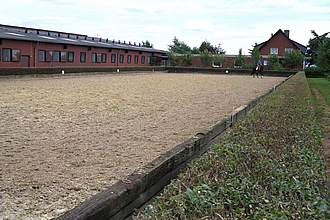 Riding arena reinforced with the Lubratec separation layer