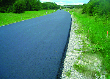A new layer of tarmac on a country road