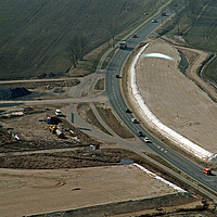 Road with Stabilenka fabric on both sides to prevent erosion