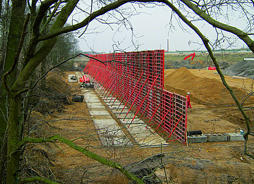 Erection of formwork for the construction of the bridge structure.