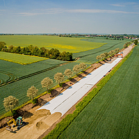 Bird's eye view of construction site shows partially laid Stabilenka geogrid