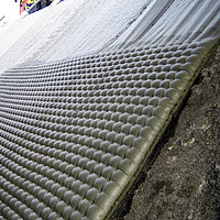 Duct wall covered with Incomat® Standard concrete mat