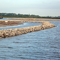 Stone dam on the bank of a water body