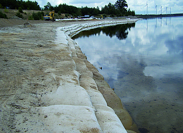 Close-up of a riverbank stabilised using SoilTain Bags