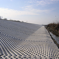 Incomat Crib cover on the levee side for temporary erosion control.