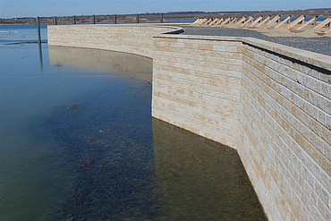 Completed wall on the riverbank