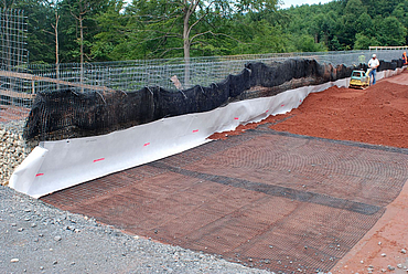 Construction of a road using geogrids.