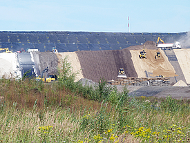 Installation of geosynthetic systems for extension and intermediate sealing of the landfill to protect against liquid ingress into the old landfill body