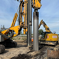 Large drill creates a hole in the floor for placing a Ringtrac® column