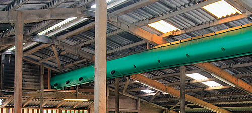Lubratec Tube Air Ventilation hose on the ceiling of an old stable building
