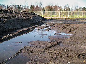 Ground surface with low bearing capacity due to puddle formation