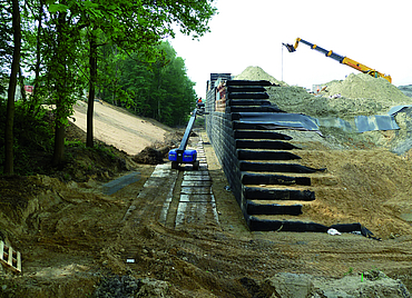 Construction of a staircase-shaped bridge.