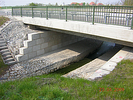 Dam structure as a reconstruction measure on a formerly eroded embankment
