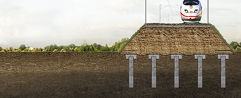 Effective reinforcement of the earth dam with large pile grids